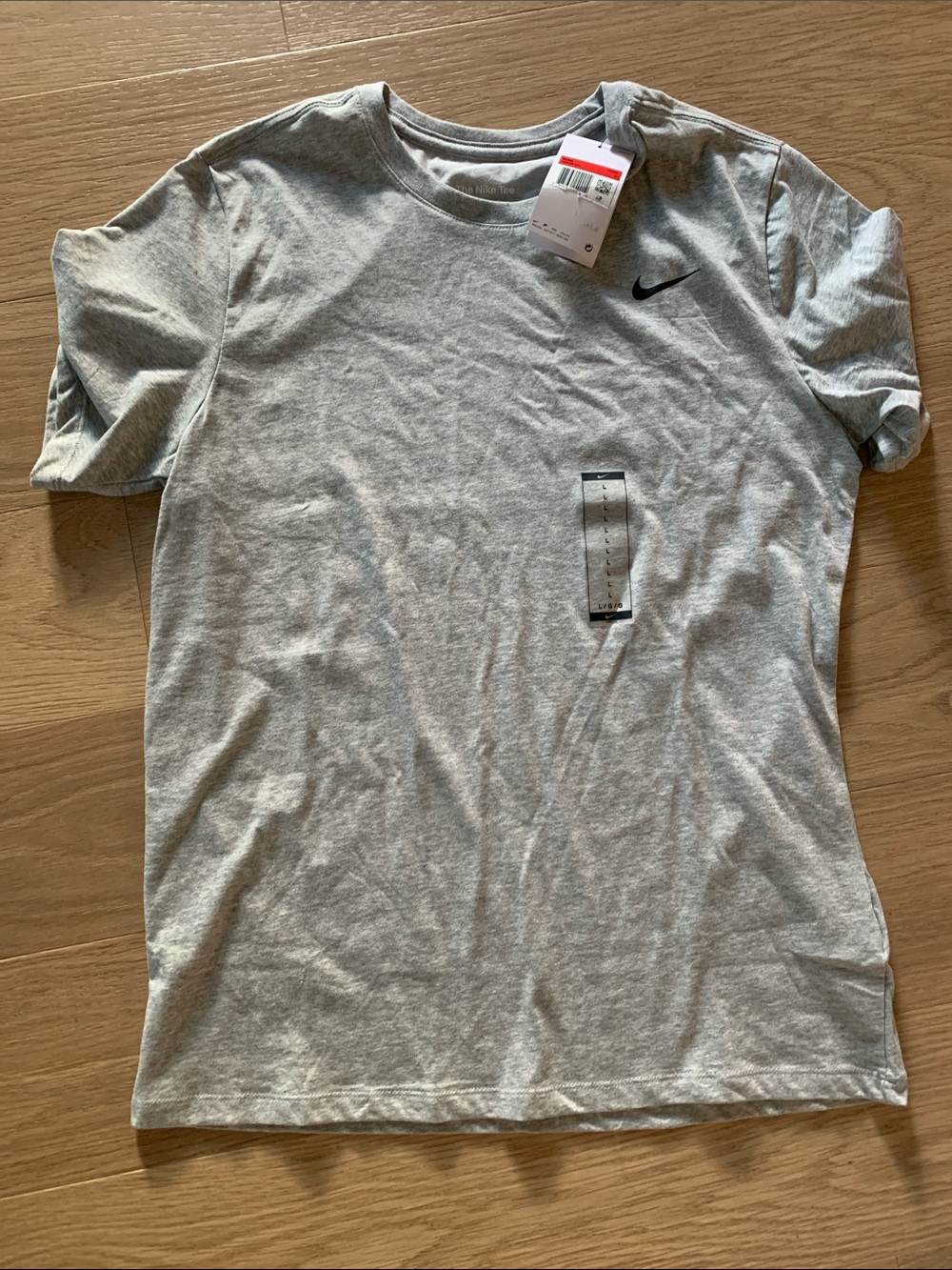 Nike Men’s Light Grey Short-Sleeve Tee with Black Swoosh